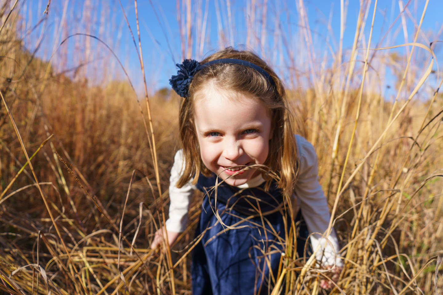 Eagan Family Photography - girl playing in the grass