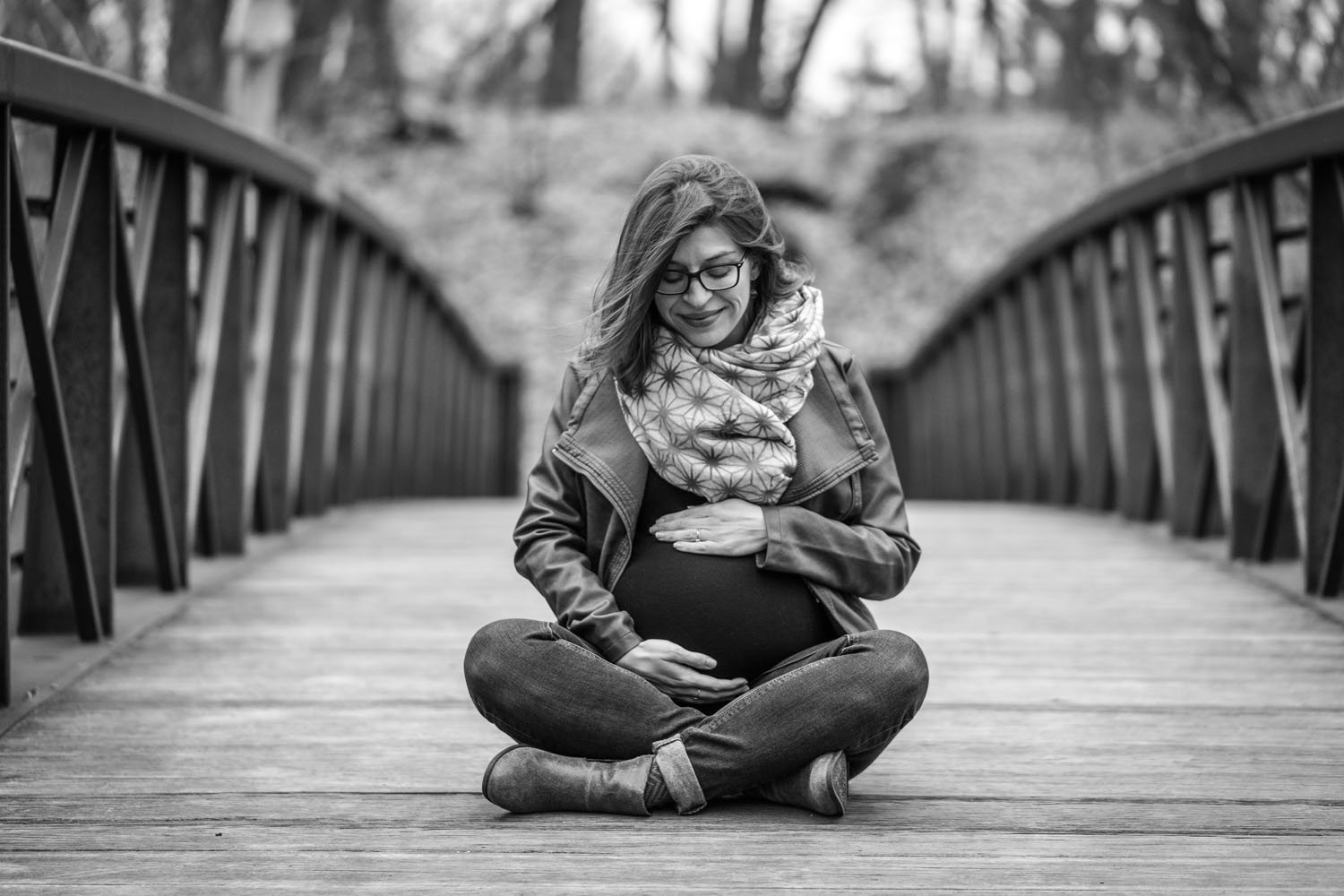 River Road Maternity Session - cross-legged bridge