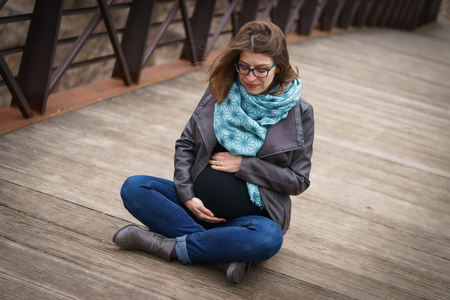 River Road Maternity Session - cross-legged bridge