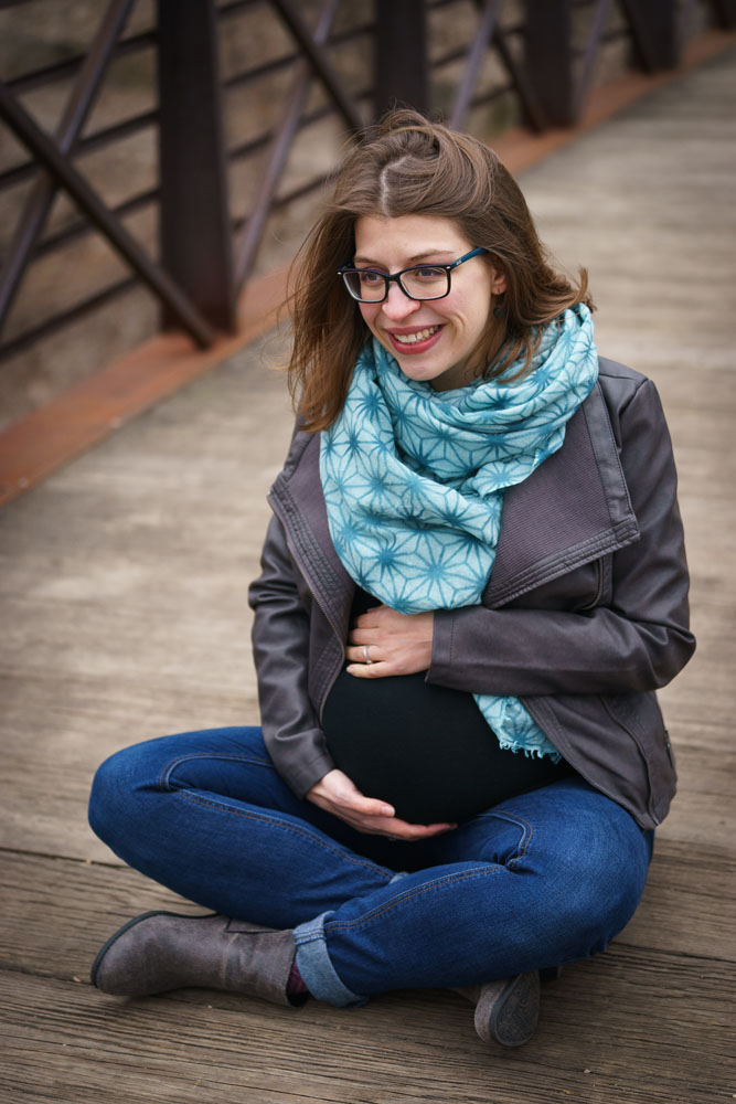 River Road Maternity Session - cross-legged bridge