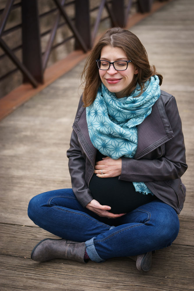 River Road Maternity Session - cross-legged bridge